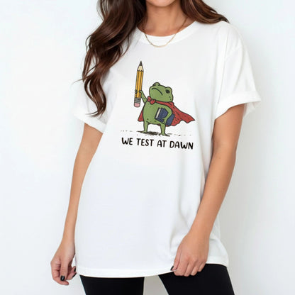 Funny Teacher Frog T-Shirt – “We Test At Dawn” Exam Humor Tee, Classroom Joke Shirt