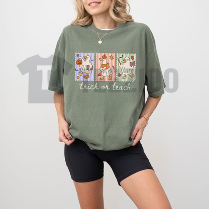 Front view of Comfort Colors Funny Teacher Goose Halloween Shirt styled in a cozy fall teacher outfit - teezioo
