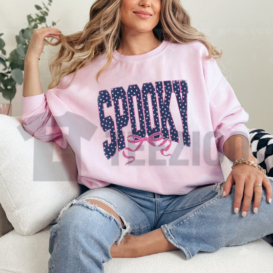 Front view of Girly Spooky Sweatshirt styled in a cute pink pastel fall aesthetic outfit - teezioo