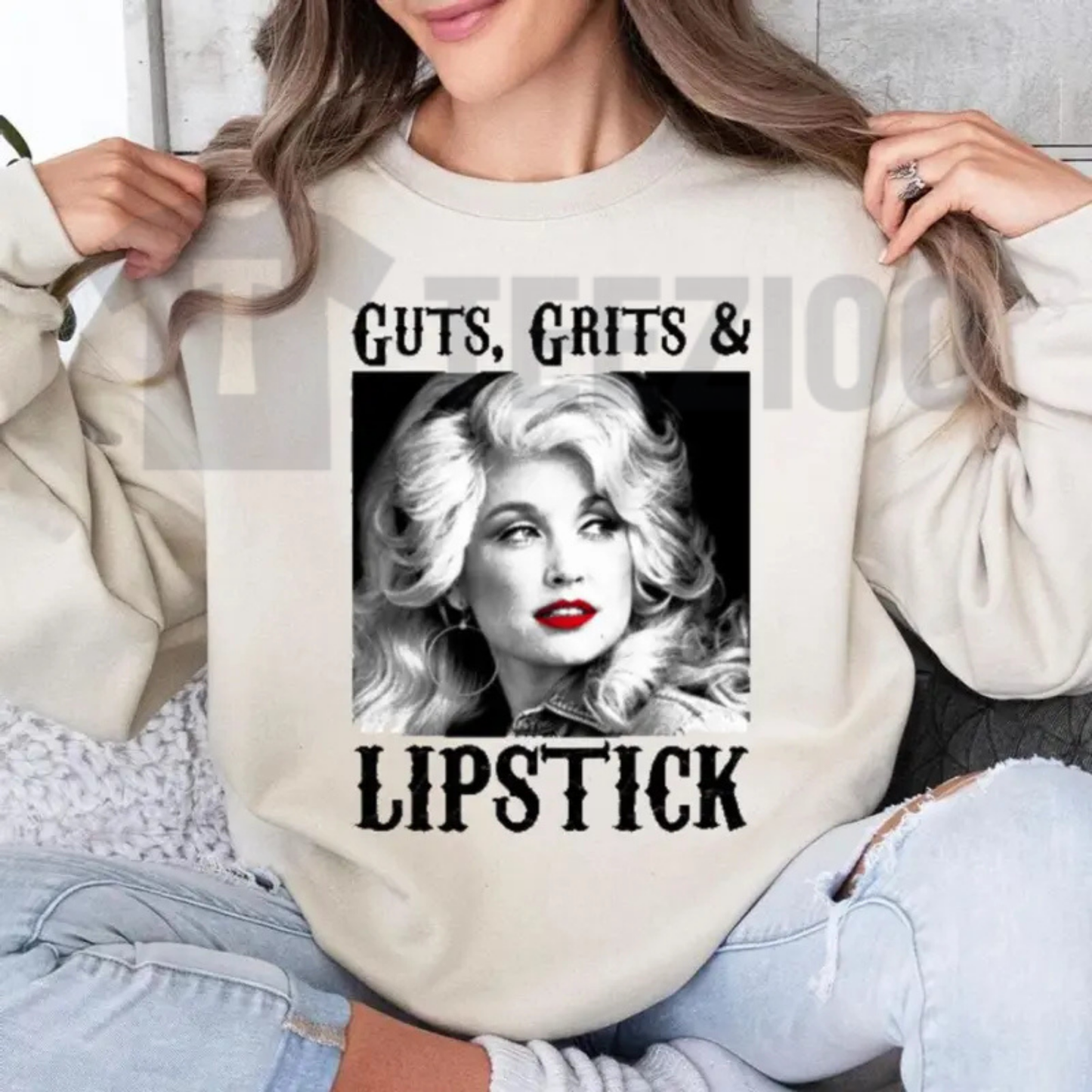 Front view of Guts Grit And Lipstick Sweatshirt styled in a western rodeo outfit with cowboy boots - teezioo