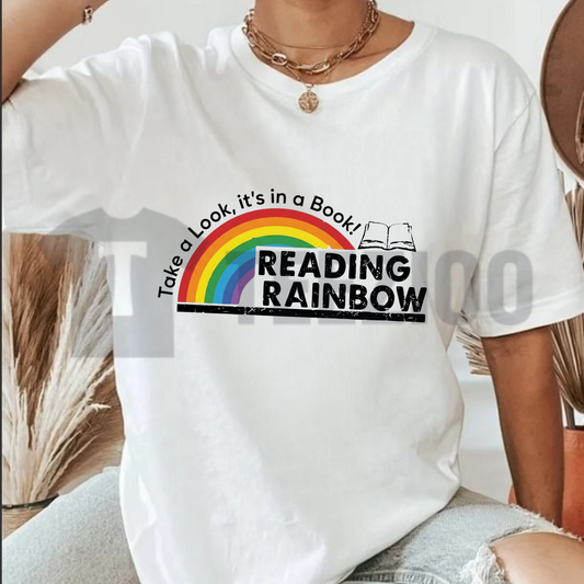 Front view of Retro Reading Rainbow Graphic Tee in a colorful vintage pop-culture style - teezioo