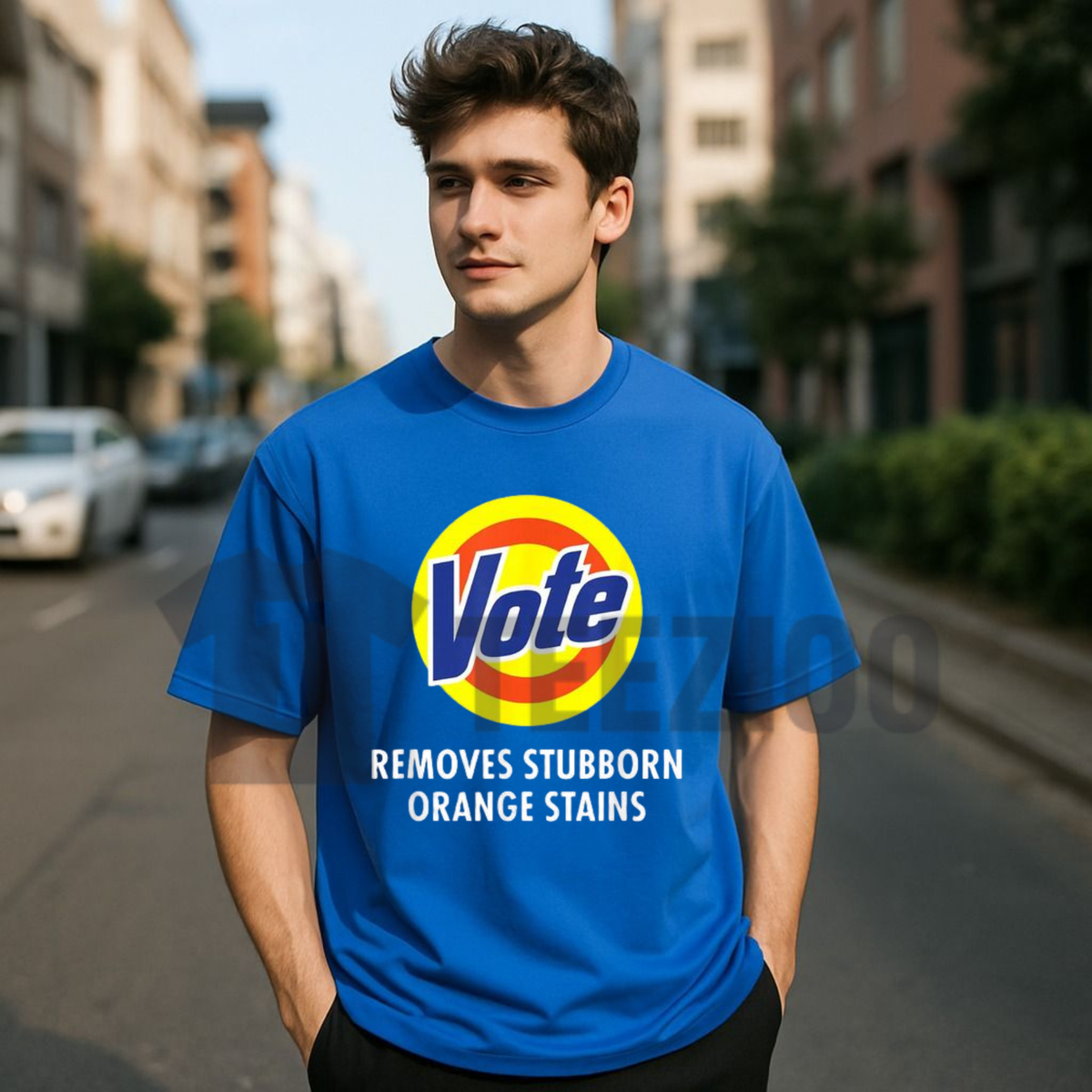 Front view of Vote Removes Stubborn Orange Stains T-Shirt styled in a casual everyday outfit with denim jeans and sneakers - teezioo