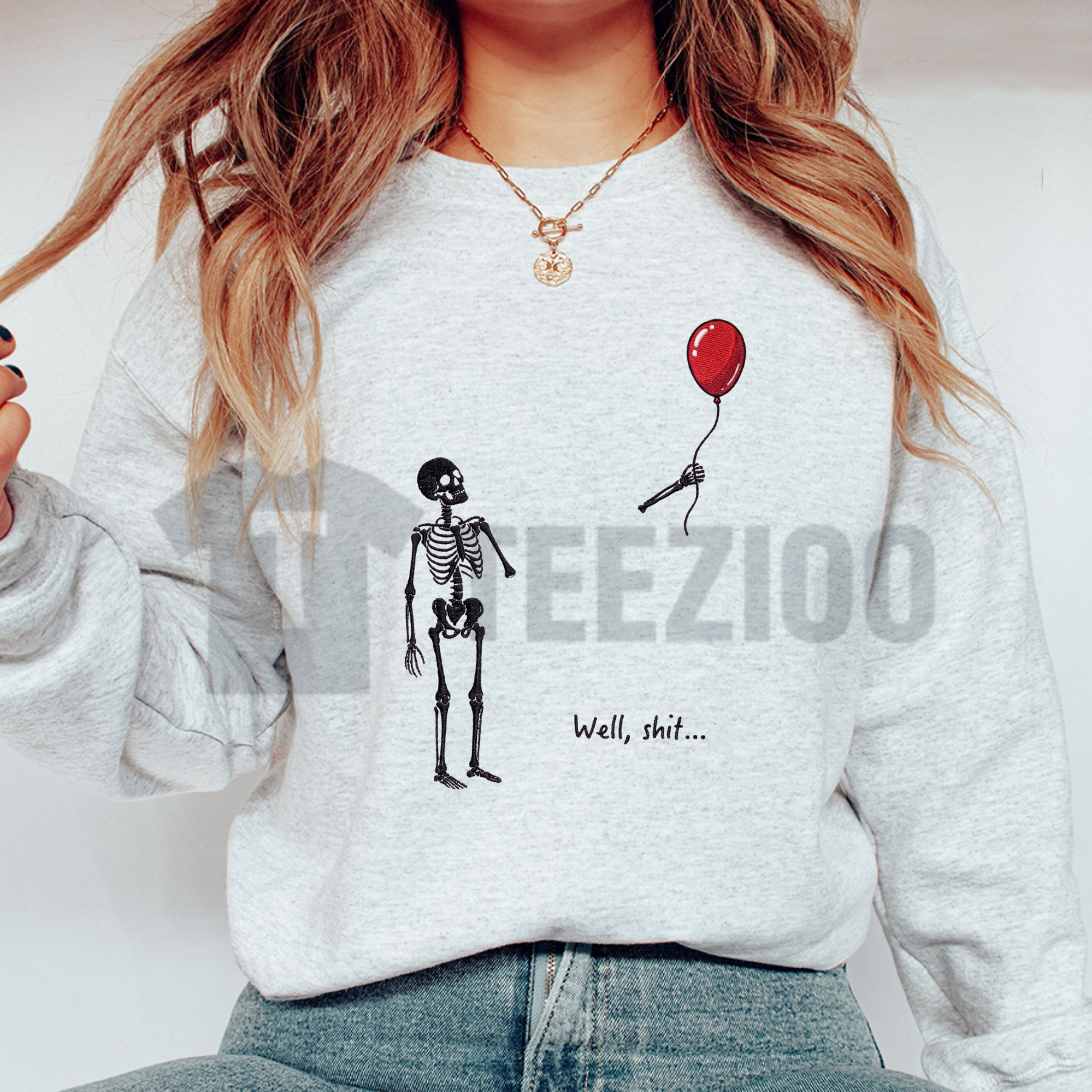 Front view of Well Shit Skeleton Balloon Sweatshirt styled in a casual sarcastic outfit - teezioo